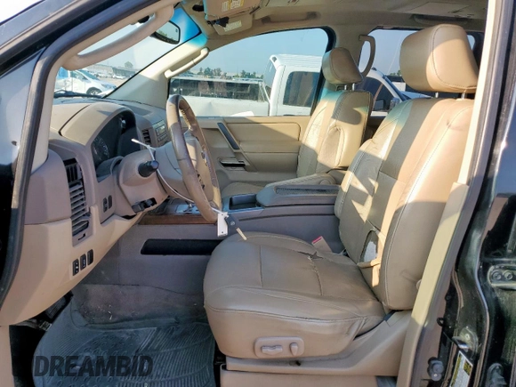 2008 Nissan Titan with VIN 1N6BA07F08N310449, listed as a Copart auction lot 58926115 with 323,607 mi miles and Salvage title. Bid and sale history available at DreamBid. Image 7.