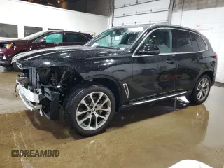 2023 BMW X5 xDrive40i with VIN 5UXCR6C08P9P64748, listed as a Copart auction lot 64542945 with 57,637 mi miles and Salvage title. Bid and sale history available at DreamBid. Image 1.