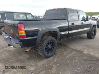 2001 GMC Sierra 1500HD SLT z VIN 1GTGK13U91F137210, wystawiony jako IAAI lot #41600294 z przebiegiem 156 589 mil mil oraz . Historia ofert i sprzedaży dostępna na DreamBid. Obrazek 4.