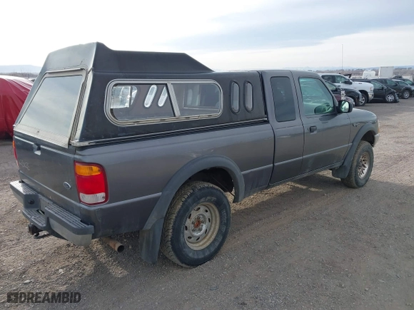 1999 Ford Ranger XLT with VIN 1FTZR15X2XTA82007, listed as a IAAI auction lot 41746346 with 229,182 mi miles. Bid and sale history available at carsss.com. Image 4.
