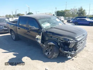 2023 Ram 1500 Tradesman with VIN 1C6SRFGT4PN657325, listed as a IAAI auction lot 40932007 with 42,639 mi miles and . Bid and sale history available at DreamBid. Image 1.