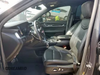 2022 Cadillac XT6 Premium Luxury z VIN 1GYKPCRS1NZ104567, wystawiony jako Copart lot #58211505 z przebiegiem 54 541 mil mil oraz Tytuł czysty. Historia ofert i sprzedaży dostępna na DreamBid. Obrazek 7.