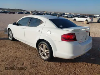 2014 Dodge Avenger SE with VIN 1C3CDZAB6EN180864, listed as a IAAI auction lot 41855043 with 99,977 mi miles. Bid and sale history available at carsss.com. Image 3.