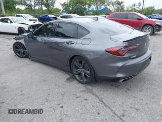 2023 Acura TLX w/A-Spec Package z VIN 19UUB6F58PA006068, wystawiony jako IAAI lot #41922648 z przebiegiem 32 779 mil mil oraz . Historia ofert i sprzedaży dostępna na DreamBid. Obrazek 3.