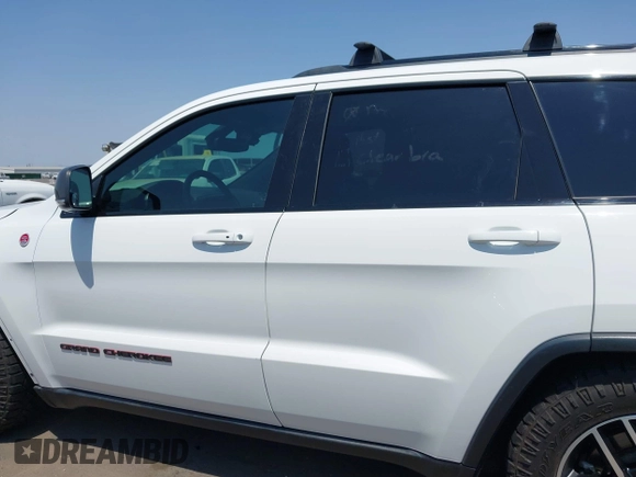 2019 Jeep Grand Cherokee Trailhawk with VIN 1C4RJFLT7KC751143, listed as a IAAI auction lot 42749406 with 54,024 mi miles and . Bid and sale history available at DreamBid. Image 15.