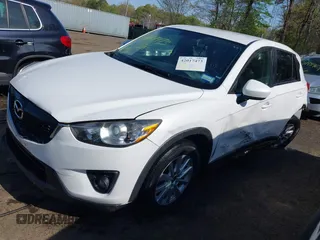 2014 Mazda CX-5 Touring with VIN JM3KE2CY5E0329783, listed as a IAAI auction lot 42017473 with 121,175 mi miles. Bid and sale history available at carsss.com. Image 17.