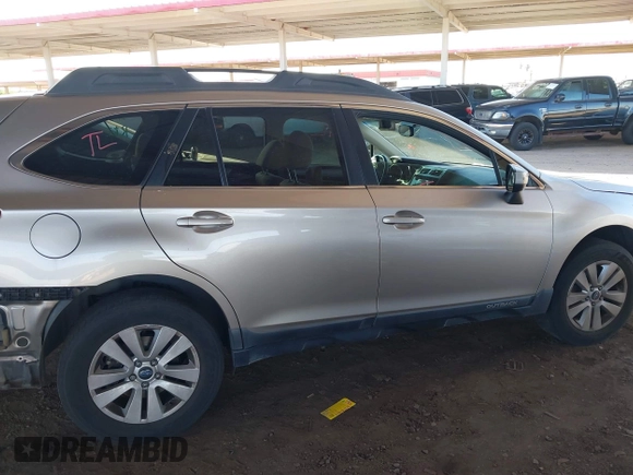 2015 Subaru Outback Premium with VIN 4S4BSACC0F3325927, listed as a IAAI auction lot 42450142 with 140,566 mi miles and . Bid and sale history available at DreamBid. Image 14.