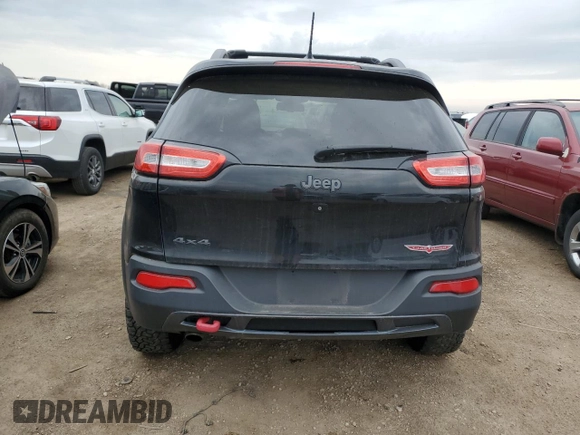 2015 Jeep Cherokee Trailhawk с VIN 1C4PJMBB5FW615179, выставлен на аукционе Copart как лот 54600985 с пробегом 133 724 миль миль и Списание • Salvage title. История ставок и продаж доступна на DreamBid. Изображение 6.