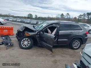 2014 Jeep Grand Cherokee Laredo with VIN 1C4RJEAG1EC573704, listed as a IAAI auction lot 41864355 with 141,970 mi miles. Bid and sale history available at carsss.com. Image 15.