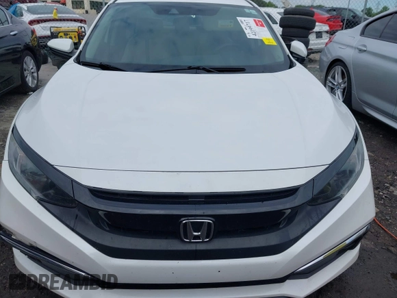 2020 Honda Civic LX с VIN 19XFC2F67LE015275, выставлен на аукционе IAAI как лот 42199717 с пробегом 141 018 миль миль и . История ставок и продаж доступна на DreamBid. Изображение 12.