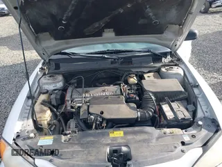 2001 Pontiac Grand Am SE1 with VIN 1G2NF52TX1M560650, listed as a IAAI auction lot 41654339 with 122,885 mi miles. Bid and sale history available at carsss.com. Image 10.