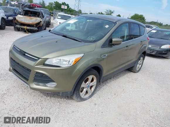 2013 Ford Escape SE with VIN 1FMCU9GX7DUC32369, listed as a IAAI auction lot 42144967 with 156,275 mi miles and . Bid and sale history available at DreamBid. Image 2.