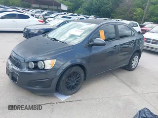 2013 Chevrolet Sonic LS with VIN 1G1JA5SH4D4138164, listed as a IAAI auction lot 42677319 with 144,244 mi miles and . Bid and sale history available at DreamBid. Image 2.