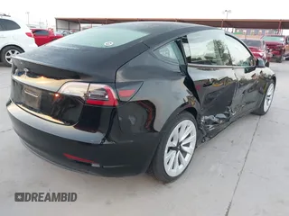 2023 Tesla Model 3 z VIN 5YJ3E1EA4PF552103, wystawiony jako IAAI lot #40782218 z przebiegiem 20 997 mil mil oraz . Historia ofert i sprzedaży dostępna na DreamBid. Obrazek 4.