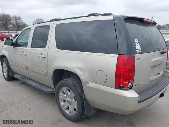 2013 GMC Yukon XL SLT with VIN 1GKS1KE02DR330318, listed as a IAAI auction lot 41526110 with 187,699 mi miles. Bid and sale history available at carsss.com. Image 3.