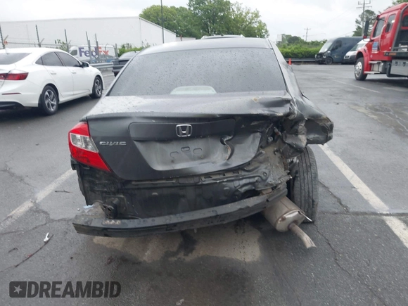 2012 Honda Civic LX with VIN 2HGFB2F58CH593658, listed as a IAAI auction lot 41965400 with 172,340 mi miles and . Bid and sale history available at DreamBid. Image 16.