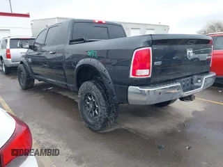 2015 Ram 2500 Laramie with VIN 3C6UR5NL2FG614941, listed as a IAAI auction lot 41785882 with 155,061 mi miles and . Bid and sale history available at DreamBid. Image 3.