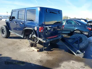 2008 Jeep Wrangler Unlimited Rubicon with VIN 1J8GA69158L616452, listed as a IAAI auction lot 41391875 with 91,143 mi miles and . Bid and sale history available at DreamBid. Image 3.