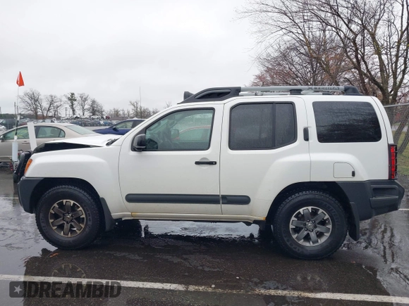 2014 Nissan Xterra X with VIN 5N1AN0NW4EN814113, listed as a IAAI auction lot 41969236 with 111,857 mi miles and . Bid and sale history available at DreamBid. Image 14.