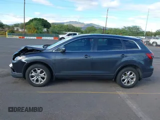 2014 Mazda CX-9 Sport with VIN JM3TB3BAXE0442006, listed as a IAAI auction lot 41430742 with 82,682 mi miles and . Bid and sale history available at DreamBid. Image 14.