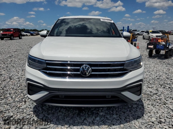 2023 Volkswagen Tiguan SE with VIN 3VV3B7AX6PM130952, listed as a Copart auction lot 56614335 with 24,996 mi miles and Salvage title. Bid and sale history available at DreamBid. Image 5.
