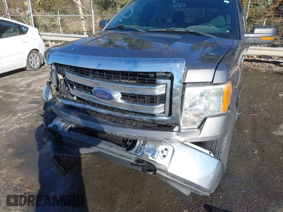 2013 Ford F-150 XL with VIN 1FTFW1EF2DFA96986, listed as a IAAI auction lot 41287963 with 191,143 mi miles. Bid and sale history available at carsss.com. Image 6.