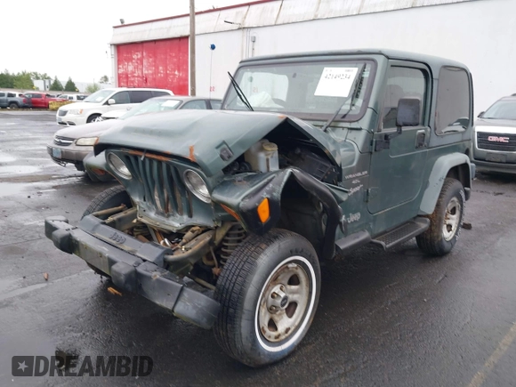 1999 Jeep Wrangler Sport with VIN 1J4FY19S6XP428003, listed as a IAAI auction lot 42149234 with 1 mi miles. Bid and sale history available at carsss.com. Image 2.
