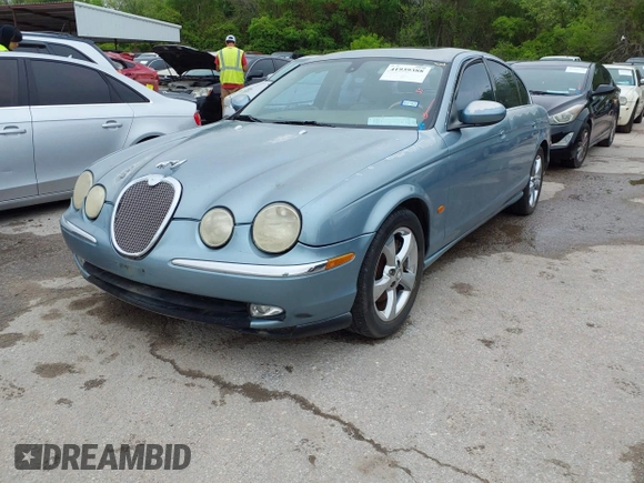 2003 Jaguar S-Type with VIN SAJEA01U33HM70079, listed as a IAAI auction lot 41939388 with 147,975 mi miles and . Bid and sale history available at DreamBid. Image 2.