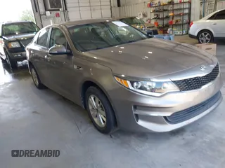 2018 Kia Optima S with VIN 5XXGT4L35JG209561, listed as a IAAI auction lot 42526577 with 161,906 mi miles and . Bid and sale history available at DreamBid. Image 1.