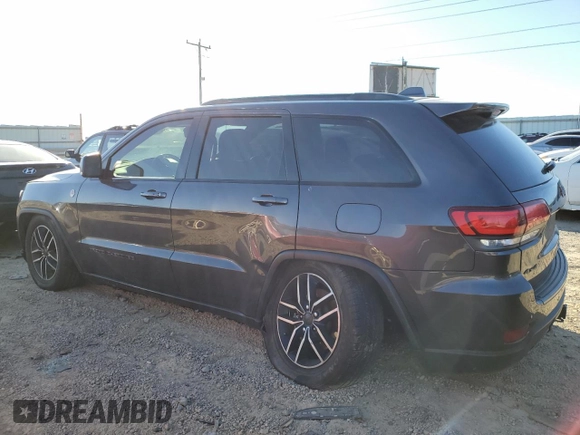 2021 Jeep Grand Cherokee Trailhawk with VIN 1C4RJFLG5MC627975, listed as a Copart auction lot 83080204 with 83,642 mi miles and Salvage Title. Bid and sale history available at carsss.com. Image 2.