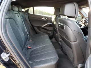 2024 BMW X6 xDrive40i with VIN 5UX33EX01R9T16988, listed as a Copart auction lot 48806495 with 0 mi miles and Salvage Title. Bid and sale history available at carsss.com. Image 11.