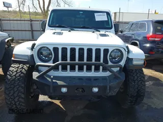 2021 Jeep Gladiator Rubicon with VIN 1C6JJTBG4ML536085, listed as a IAAI auction lot 41898204 with 39,627 mi miles and . Bid and sale history available at DreamBid. Image 12.