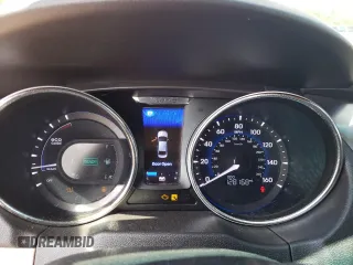 2012 Hyundai Sonata Hybrid z VIN KMHEC4A44CA039593, wystawiony jako Copart lot #55979085 z przebiegiem 128 168 mil mil oraz Czysty tytuł • Clean title. Historia ofert i sprzedaży dostępna na DreamBid. Obrazek 9.