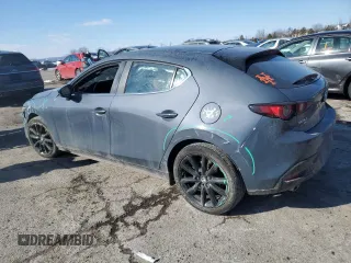 2023 Mazda 3 S Carbon Edition with VIN JM1BPBLM3P1616343, listed as a Copart auction lot 42303815 with 19,557 mi miles and Salvage title. Bid and sale history available at DreamBid. Image 2.
