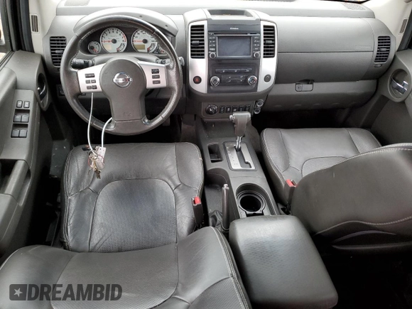 2014 Nissan Xterra X with VIN 5N1AN0NW9EN812437, listed as a Copart auction lot 83905504 with 118,805 mi miles and Salvage Title. Bid and sale history available at DreamBid. Image 8.