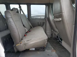 2014 Chevrolet Express Passenger LT z VIN 1GAZG1FG2E1154233, wystawiony jako Copart lot #63480385 z przebiegiem Nie podano mil oraz Nie do naprawy • Non repairable. Historia ofert i sprzedaży dostępna na DreamBid. Obrazek 11.