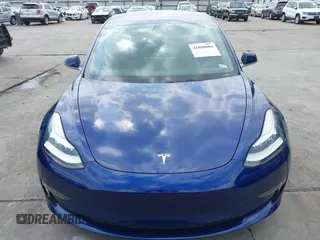 2019 Tesla Model 3 Mid Range with VIN 5YJ3E1EA5KF190453, listed as a IAAI auction lot 41880684 with 58,909 mi miles and . Bid and sale history available at carsss.com. Image 13.