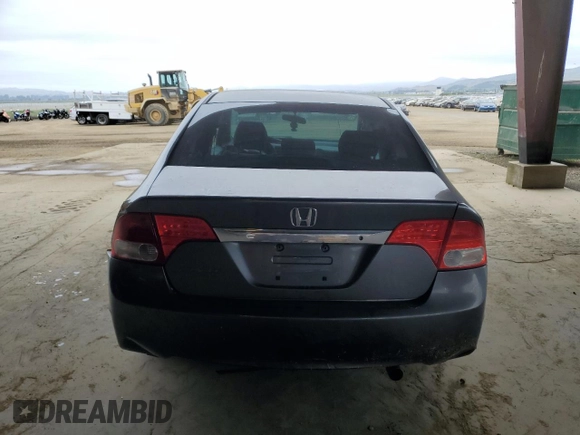 2010 Honda Civic z VIN 19XFA1E39AE037346, wystawiony jako Copart lot #53279185 z przebiegiem 148 350 mil mil oraz Szkoda całkowita • Salvage title. Historia ofert i sprzedaży dostępna na DreamBid. Obrazek 6.
