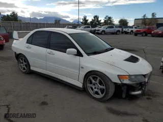 2005 Mitsubishi Lancer Evolution VIII with VIN JA3AH86D45U028033, listed as a Copart auction lot 74323774 with 204,046 mi miles and Salvage Title. Bid and sale history available at carsss.com. Image 4.