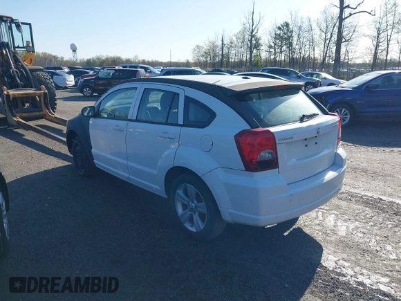 2011 Dodge Caliber Mainstreet with VIN 1B3CB3HA0BD113353, listed as a IAAI auction lot 41727663 with 116,633 mi miles and . Bid and sale history available at DreamBid. Image 3.
