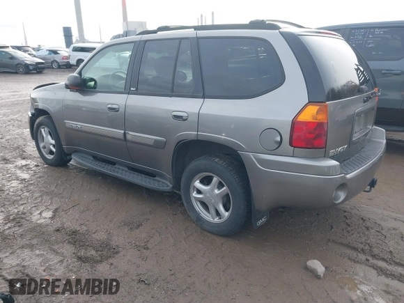 2005 GMC Envoy SLT with VIN 1GKDT13S752276414, listed as a IAAI auction lot 41052684 with 200,919 mi miles. Bid and sale history available at carsss.com. Image 3.