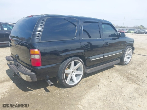 2003 Chevrolet Tahoe LT with VIN 1GNEC13Z73J322783, listed as a IAAI auction lot 41773868 with 259,710 mi miles. Bid and sale history available at carsss.com. Image 4.