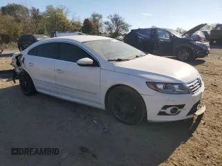 2014 Volkswagen CC R-Line with VIN WVWBP7AN2EE503420, listed as a Copart auction lot 77744894 with 99,679 mi miles and Salvage Title. Bid and sale history available at carsss.com. Image 4.