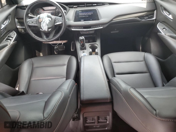 2021 Cadillac XT4 FWD Sport with VIN 1GYFZER42MF024204, listed as a Copart auction lot 63955904 with 31,262 mi miles and Salvage Title. Bid and sale history available at DreamBid. Image 8.
