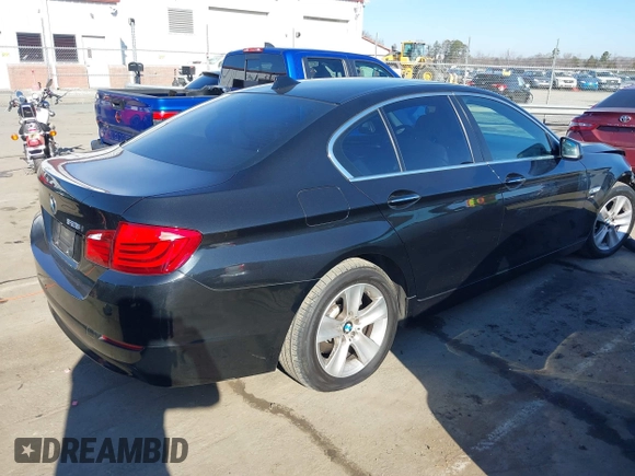 2012 BMW 5 Series 528i xDrive with VIN WBAXH5C51CDW05179, listed as a IAAI auction lot 41479229 with 160,871 mi miles. Bid and sale history available at carsss.com. Image 4.