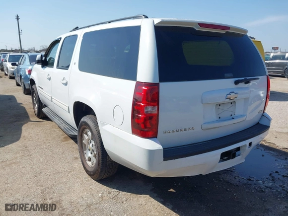2009 Chevrolet Suburban LT w/2LT with VIN 1GNFC26089R273028, listed as a IAAI auction lot 41669345 with 244,869 mi miles. Bid and sale history available at carsss.com. Image 3.