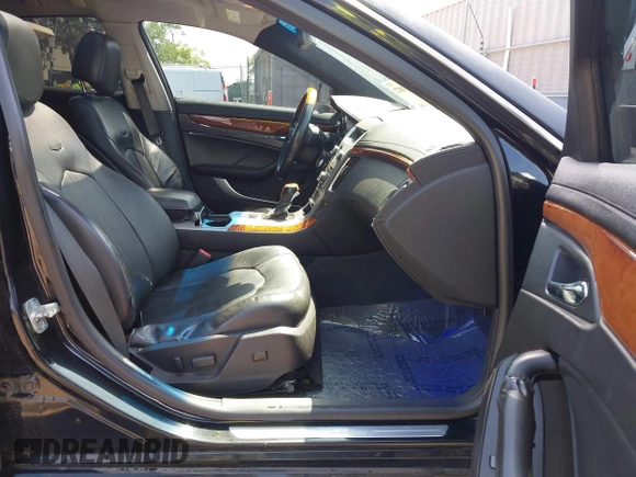 2008 Cadillac CTS RWD with VIN 1G6DV57VX80188428, listed as a IAAI auction lot 42033872 with 132,080 mi miles and . Bid and sale history available at DreamBid. Image 5.