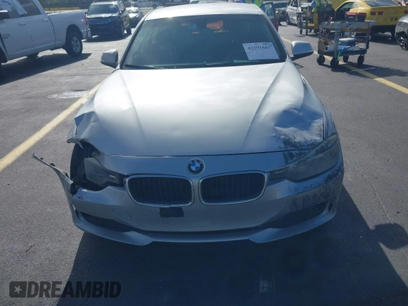 2015 BMW 3 Series 320i with VIN WBA3B1G53FNT05936, listed as a IAAI auction lot 42591667 with 143,594 mi miles and . Bid and sale history available at DreamBid. Image 12.