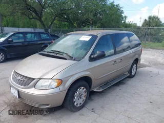 2002 Chrysler Town & Country with VIN 2C8GP44322R584429, listed as a IAAI auction lot 41938367 with Not Provided miles and . Bid and sale history available at DreamBid. Image 2.