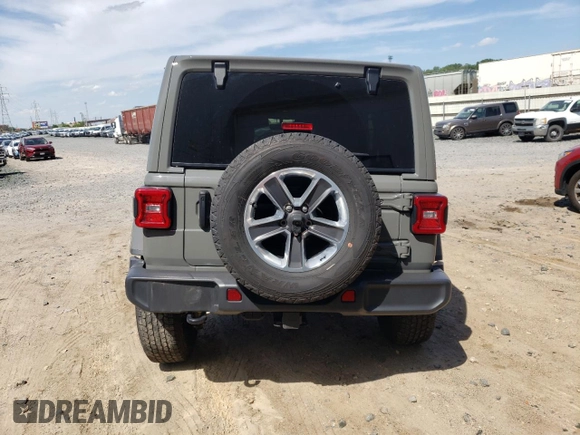2022 Jeep Wrangler Unlimited Sahara Altitude with VIN 1C4HJXEG4NW248402, listed as a Copart auction lot 63052465 with 36,732 mi miles and Salvage title. Bid and sale history available at DreamBid. Image 6.
